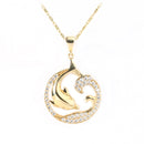 14K Yellow Gold Shiny Dolphin on Wave with CZ Pendant (Chain Sold Separately)